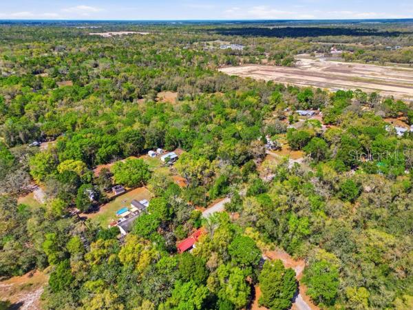 12139 Rutherford Lane Hudson, FL 34669 - Photo 10 of 11 a view of a field with an outdoor space