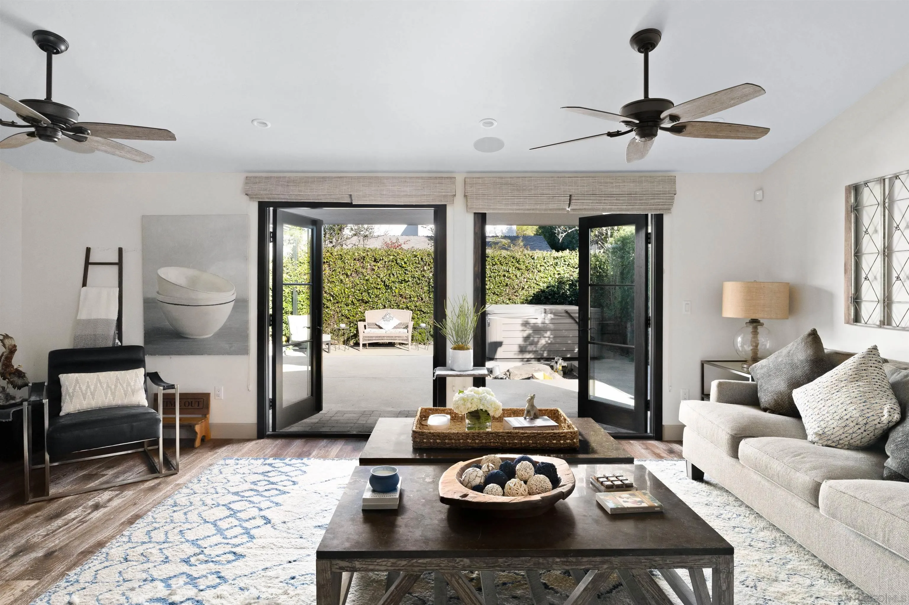 5351 Saxon Street San Diego, CA 92115 - Photo 11 of 34 a living room with furniture and a large window