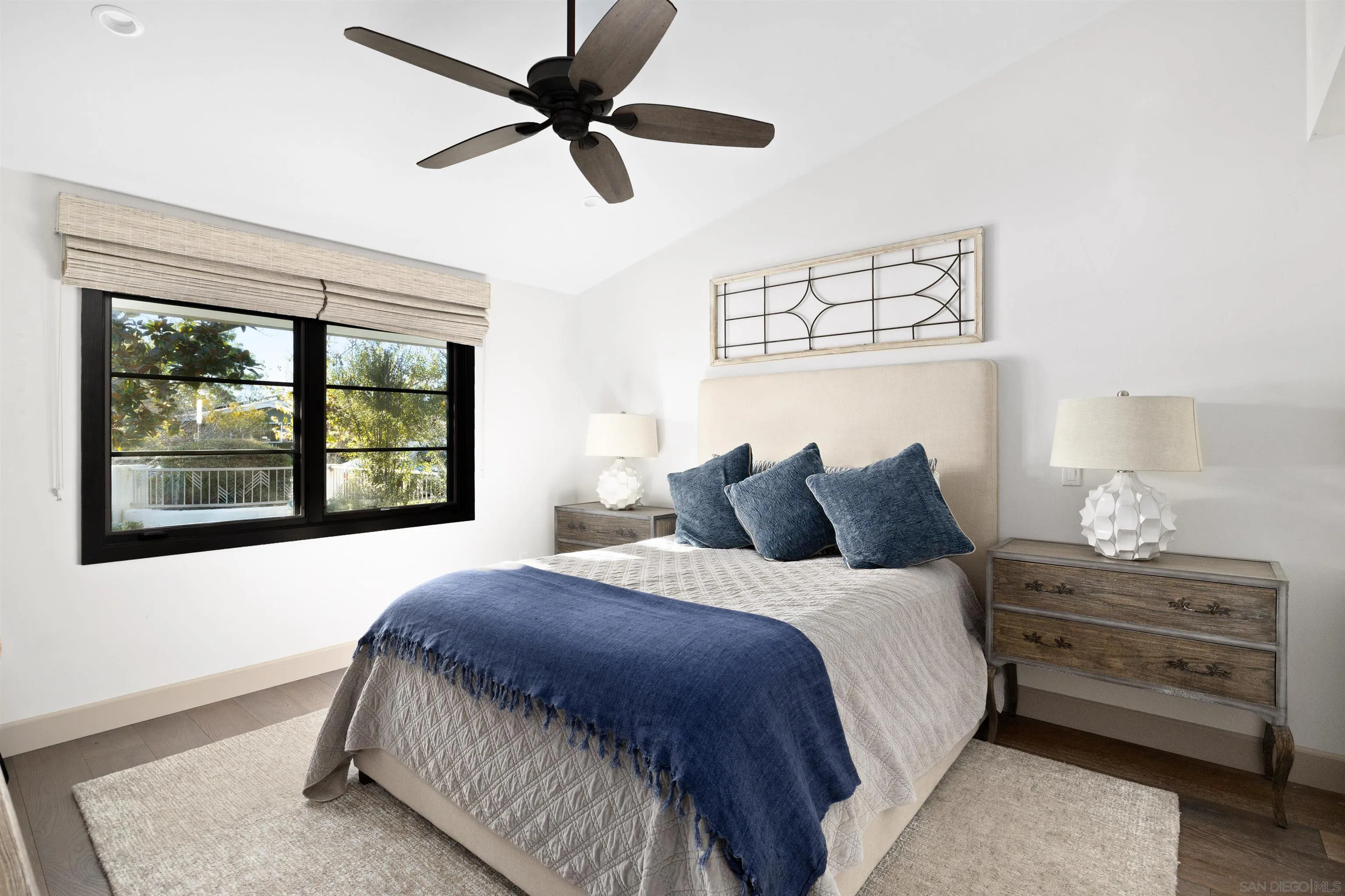 5351 Saxon Street San Diego, CA 92115 - Photo 19 of 34 a bedroom with a bed and a window