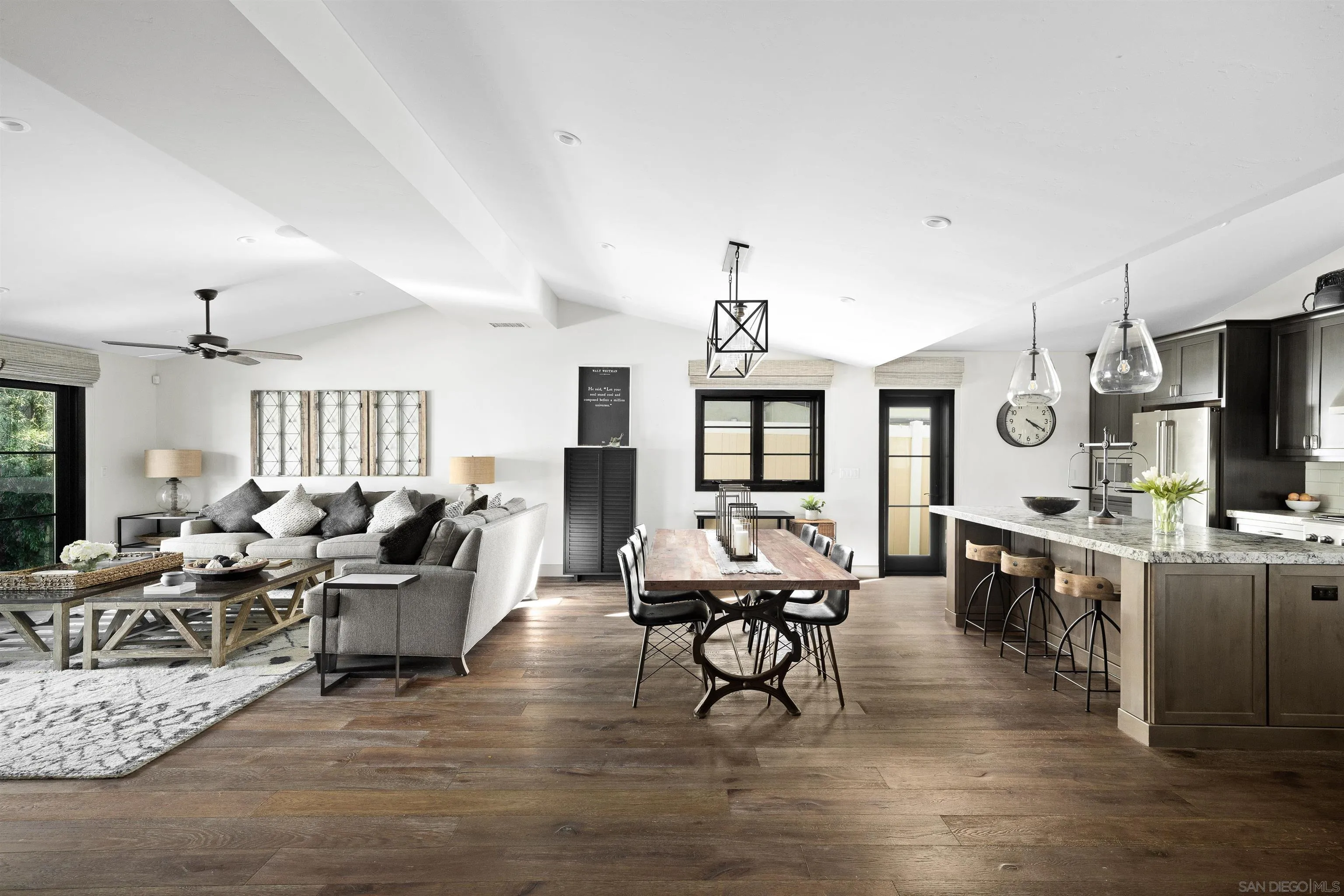5351 Saxon Street San Diego, CA 92115 - Photo 2 of 34 a living room with fireplace furniture and a flat screen tv