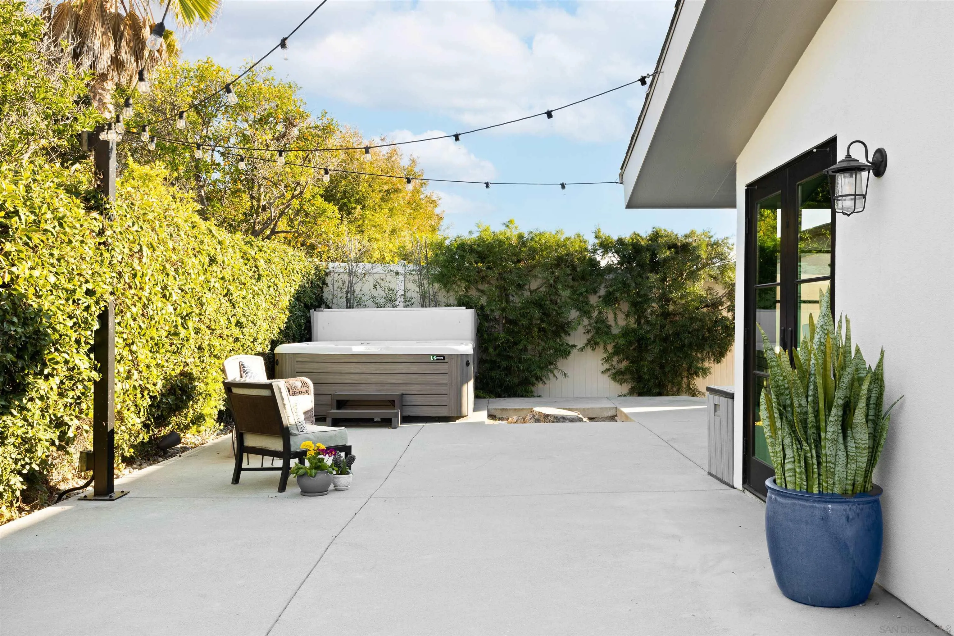 5351 Saxon Street San Diego, CA 92115 - Photo 25 of 34 a bench sitting in front of a building