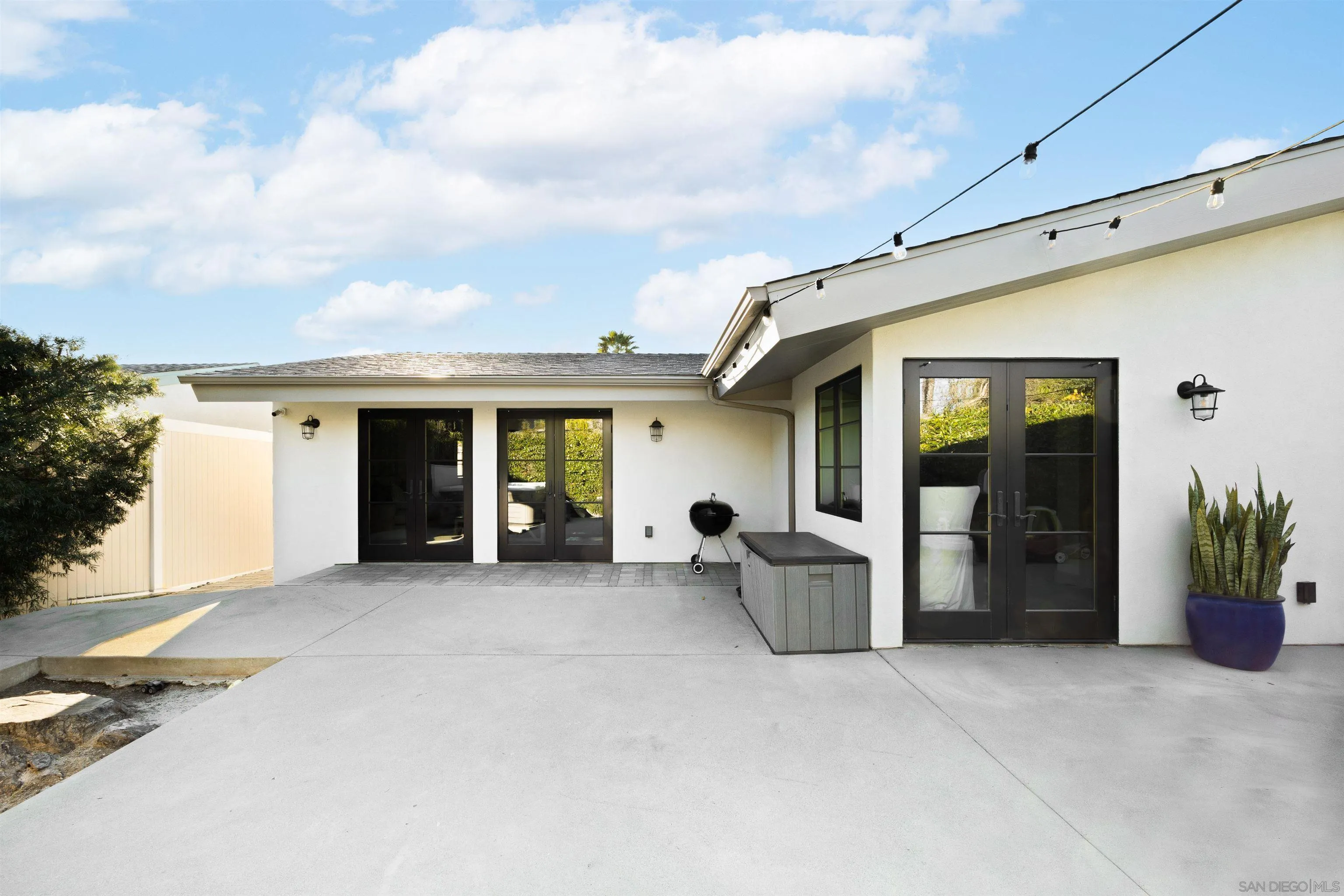 5351 Saxon Street San Diego, CA 92115 - Photo 28 of 34 a view of a patio with chair and tables
