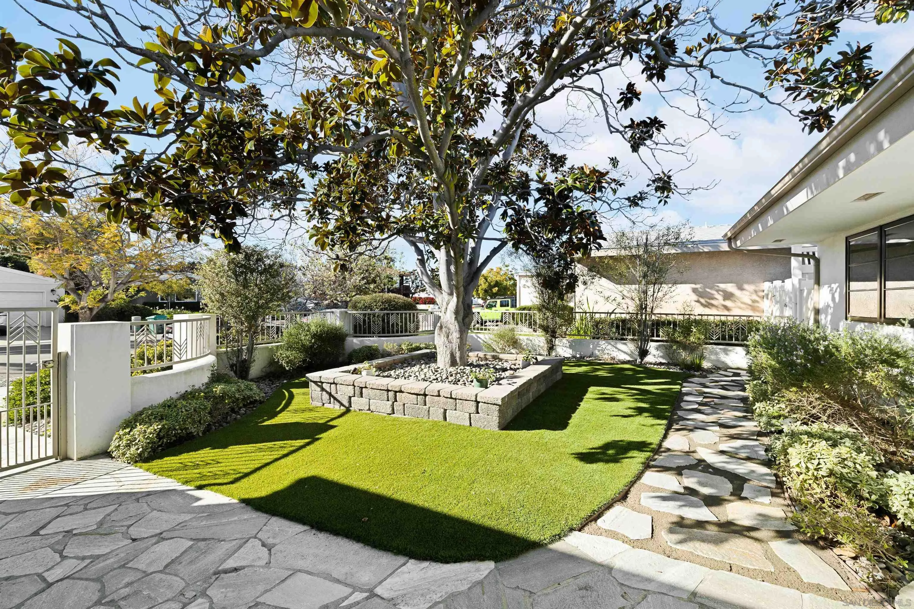 5351 Saxon Street San Diego, CA 92115 - Photo 32 of 34 a view of a swimming pool with a patio