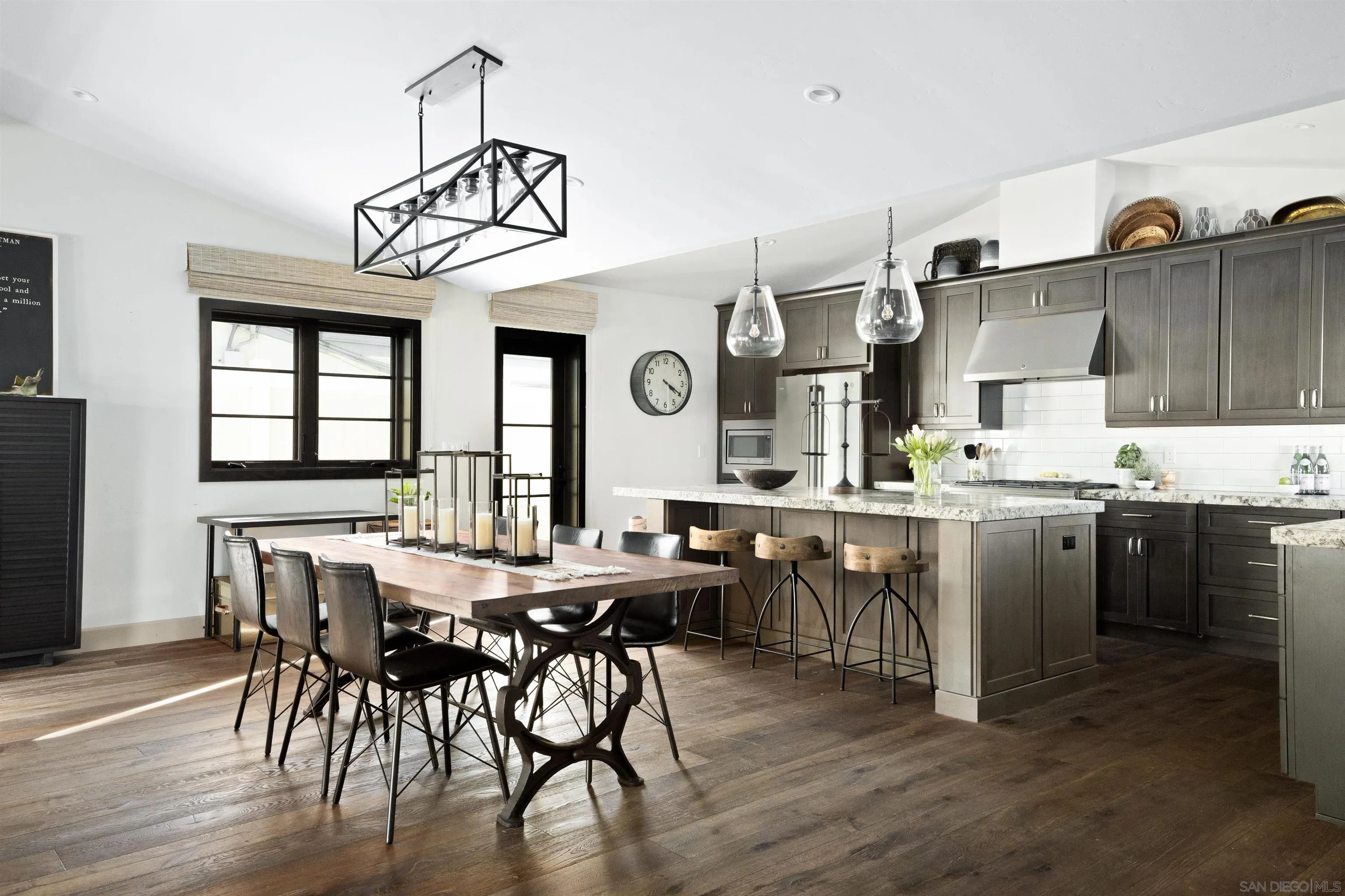 5351 Saxon Street San Diego, CA 92115 - Photo 4 of 34 a view of a dining room with furniture window and wooden floor