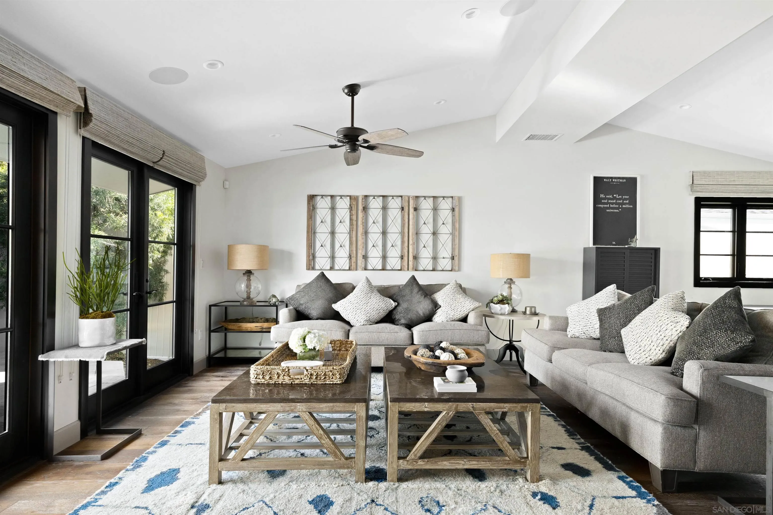5351 Saxon Street San Diego, CA 92115 - Photo 8 of 34 a living room with furniture windows and a chandelier