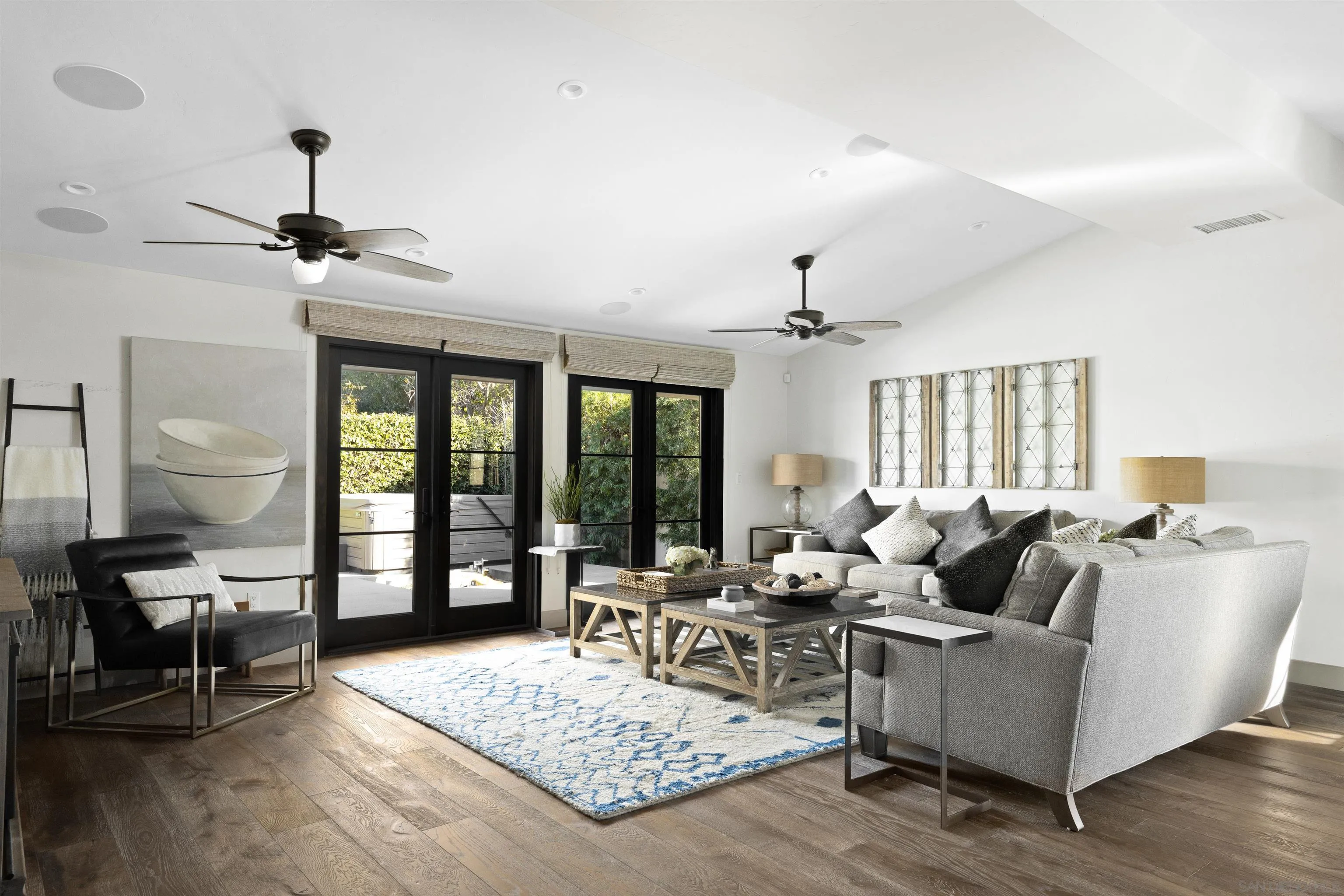 5351 Saxon Street San Diego, CA 92115 - Photo 9 of 34 a living room with furniture rug and window