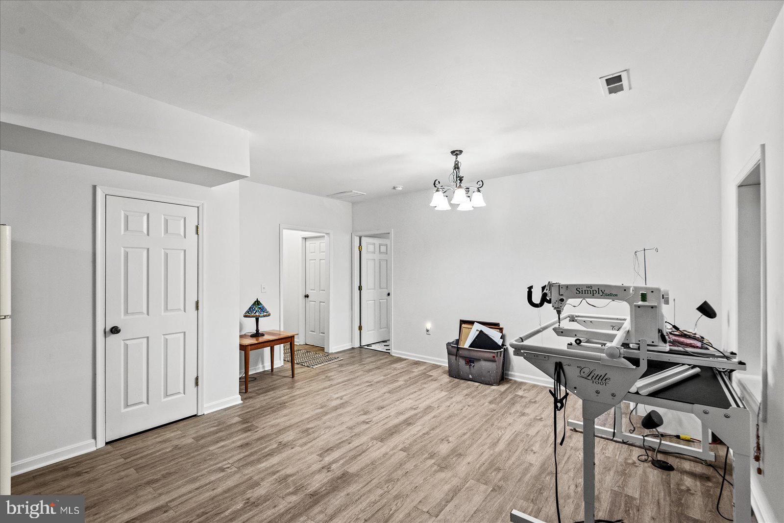 8 Franklin Cove Ruther Glen, VA 22546 - Photo 38 of 70 a view of a workspace with wooden floor