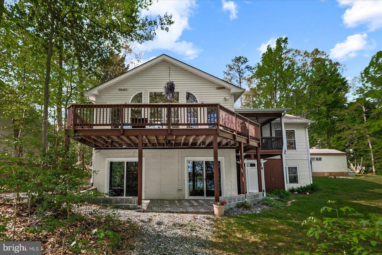 8 Franklin Cove Ruther Glen, VA 22546 - Photo 45 of 70 a front view of a house with a yard