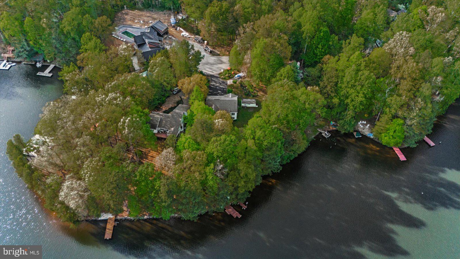8 Franklin Cove Ruther Glen, VA 22546 - Photo 58 of 70 an aerial view of a residential houses with outdoor space and trees