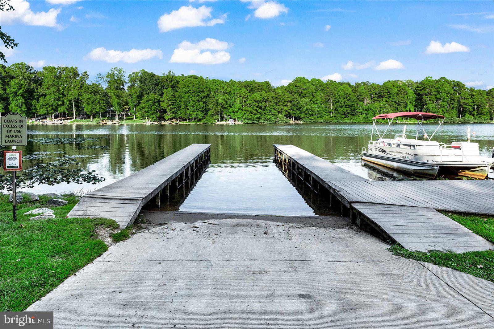 8 Franklin Cove Ruther Glen, VA 22546 - Photo 63 of 70 a view of a lake with a patio