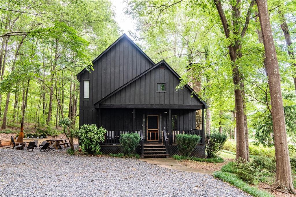 6449 Brockton Road Nicholson, GA 30565 - Photo 1 of 1 a front view of a house with garden