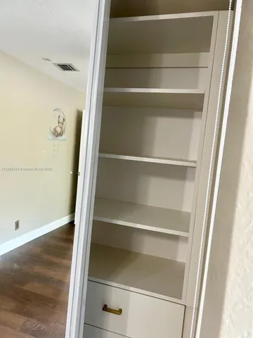 a view of storage and utility room