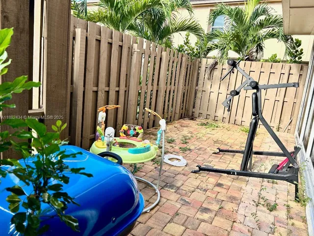 a view of a kitchen with a sink