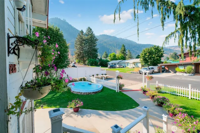a view of a swimming pool with a patio