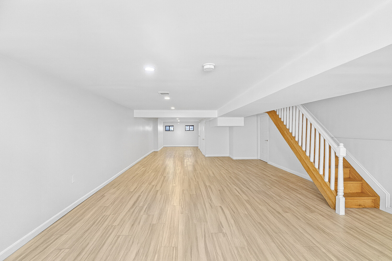 1353 Saint Marks Avenue, Unit 1 Brooklyn, NY 11233 - Photo 10 of 17 a view of empty room with wooden floor