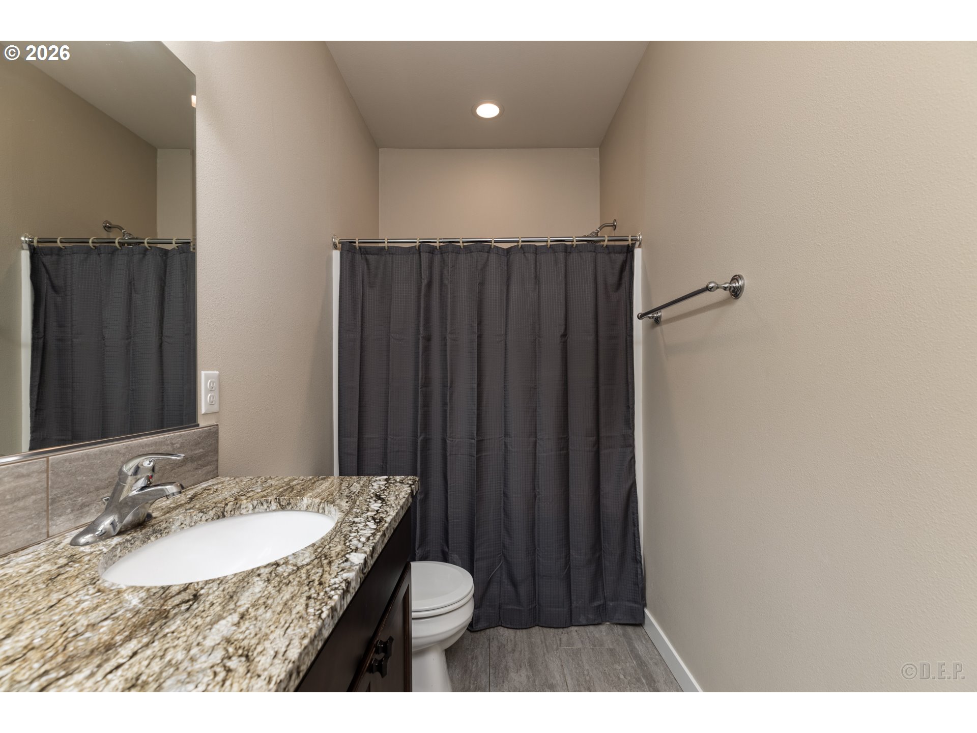 193 South 2nd Street St. Helens, OR 97051 - Photo 12 of 23 a bathroom with a granite countertop sink and a mirror