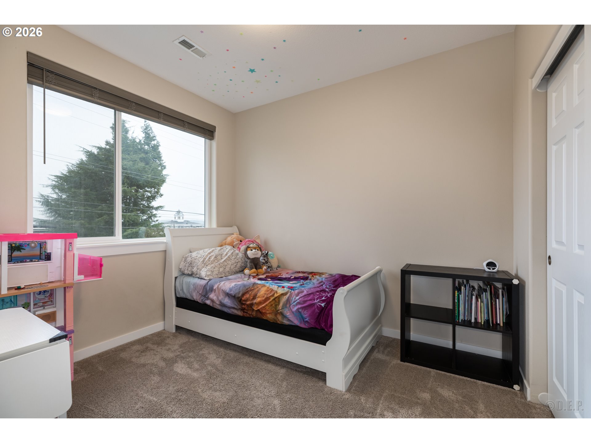 193 South 2nd Street St. Helens, OR 97051 - Photo 15 of 23 a bedroom with a bed and a large window