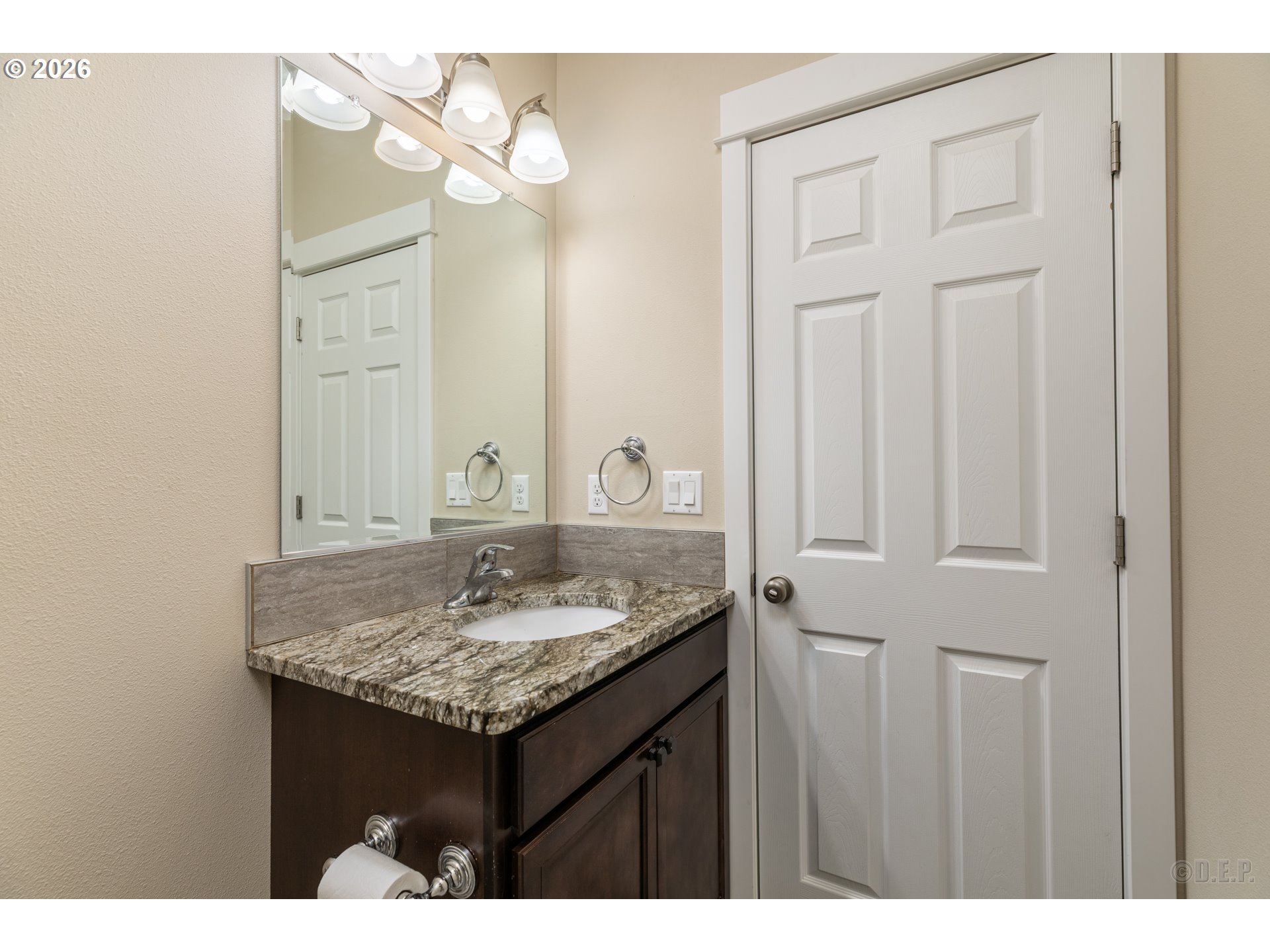 193 South 2nd Street St. Helens, OR 97051 - Photo 9 of 23 a bathroom with a granite countertop sink and a mirror