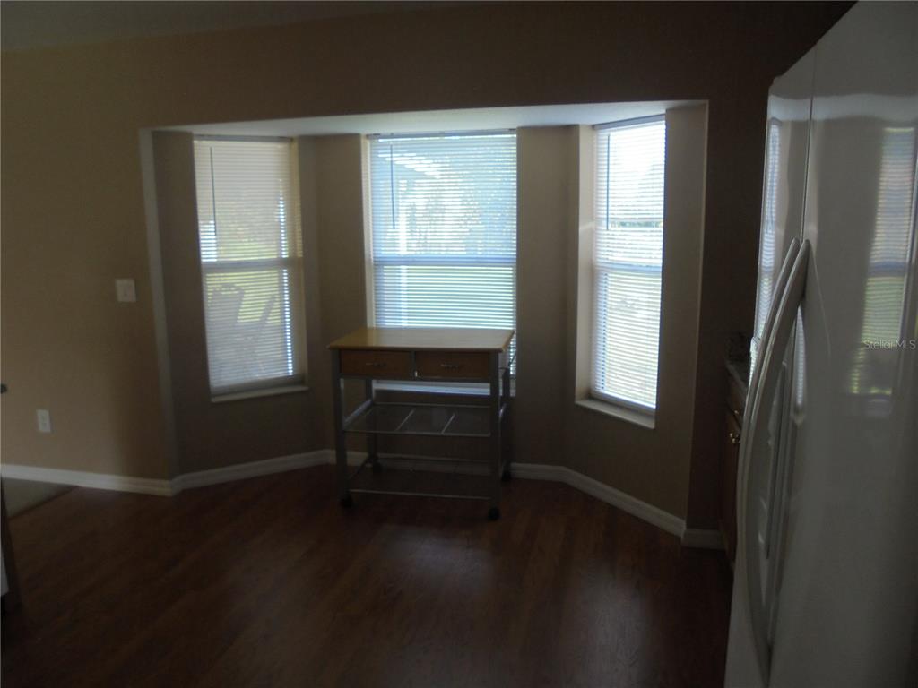 1509 Northeast 46th Road Ocala, FL 34470 - Photo 12 of 28 a room that has a window in it