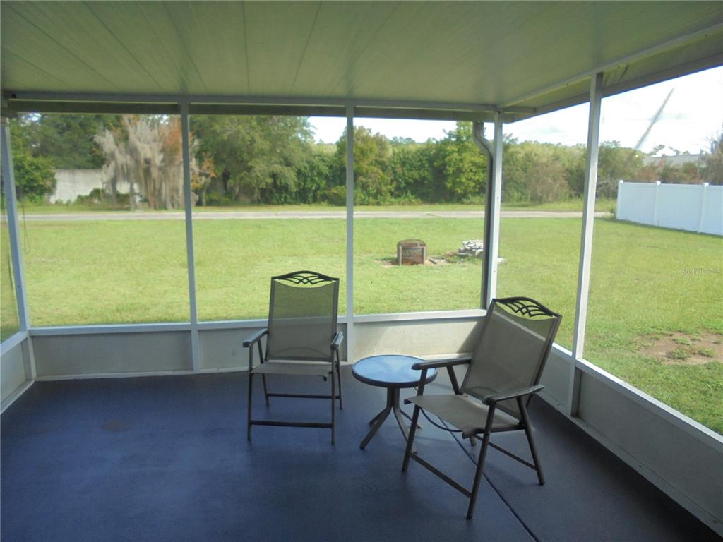 1509 Northeast 46th Road Ocala, FL 34470 - Photo 15 of 28 a room with furniture and a window