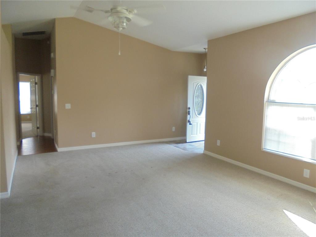 1509 Northeast 46th Road Ocala, FL 34470 - Photo 20 of 28 an empty room with a window
