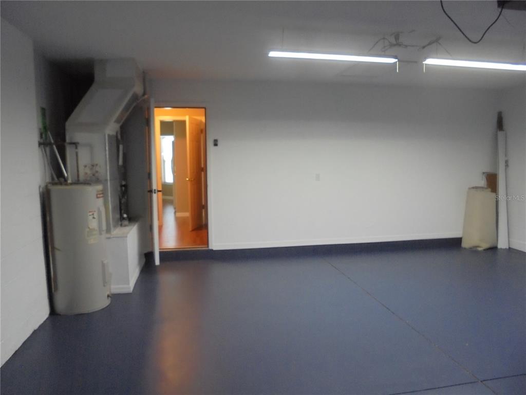 1509 Northeast 46th Road Ocala, FL 34470 - Photo 23 of 28 a view of empty room with wooden floor