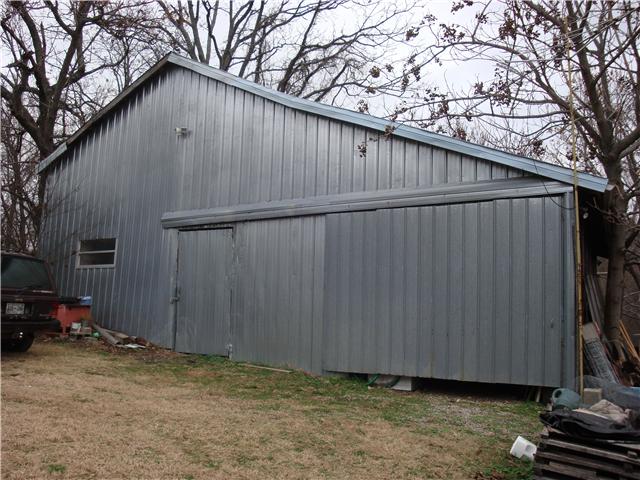 1801 Simmons Ridge Road Cornersville, TN 37047 - Photo 15 of 16 The Metal Building that is mostly used for storage has partially completed Living Space and has plumbing/wiring for a bathroom and kitchen.