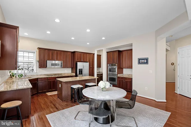 a bathroom with a sink vanity and a mirror
