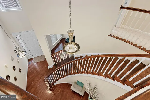 a bedroom with a bed and a table