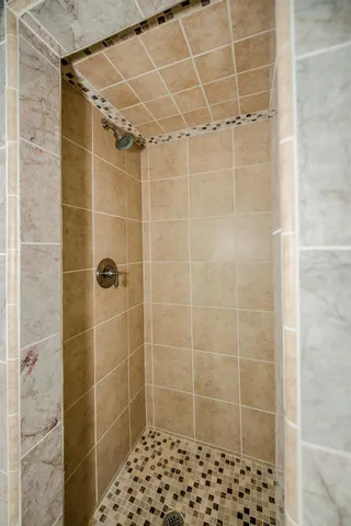 a bathroom with a sink a vanity and a mirror