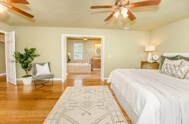 a bath room with a sink a washer and dryer