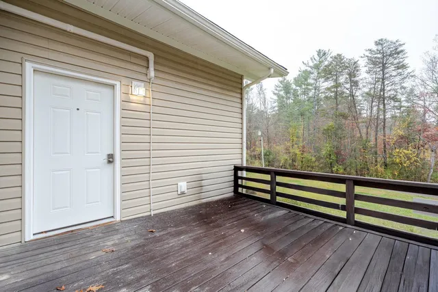 a view of a wooden bench sitting on a wooden floor