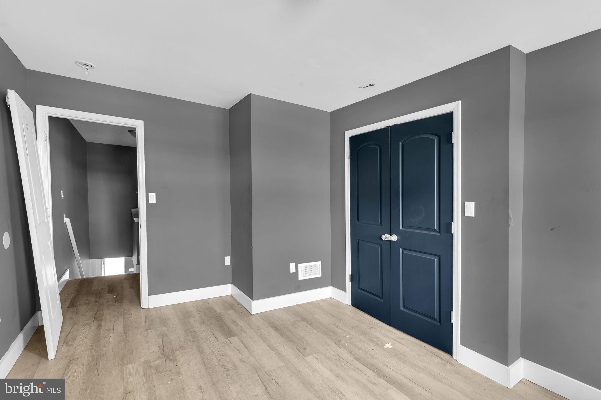 2315 East Madison Street Baltimore, MD 21205 - Photo 13 of 18 a view of empty room with wooden floor