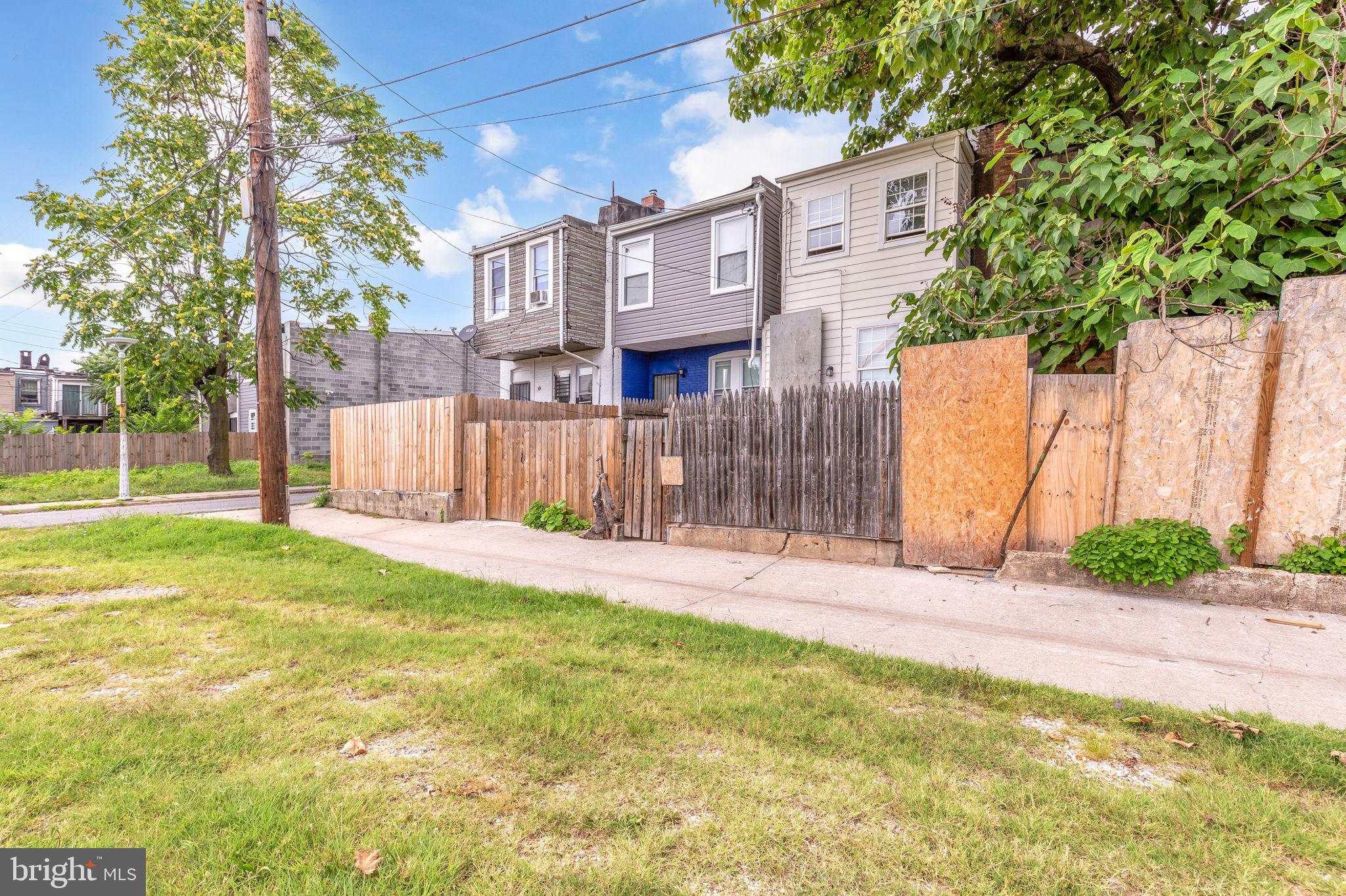2315 East Madison Street Baltimore, MD 21205 - Photo 17 of 18 a view of a street with brick building in front of it