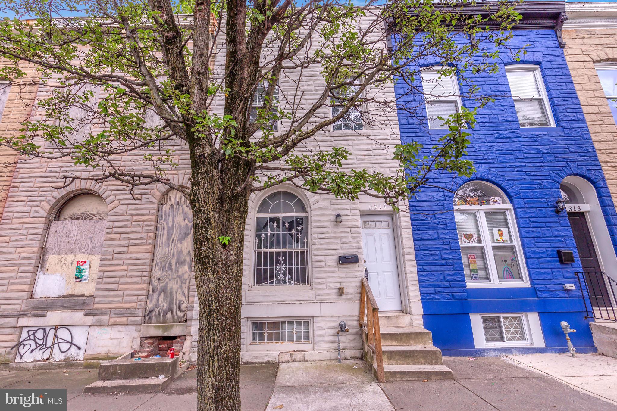 2315 East Madison Street Baltimore, MD 21205 - Photo 2 of 18 a front view of a house