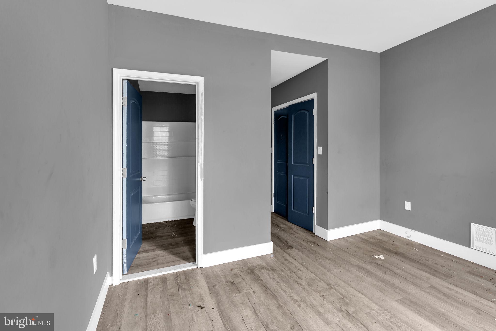2315 East Madison Street Baltimore, MD 21205 - Photo 10 of 18 wooden floor in an empty room
