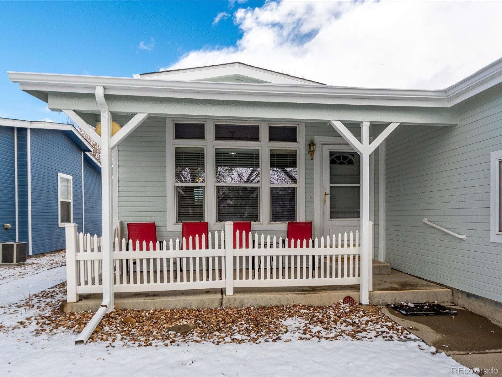 7775 Sage Green Frederick, CO 80530 - Photo 2 of 40 a front view of a house