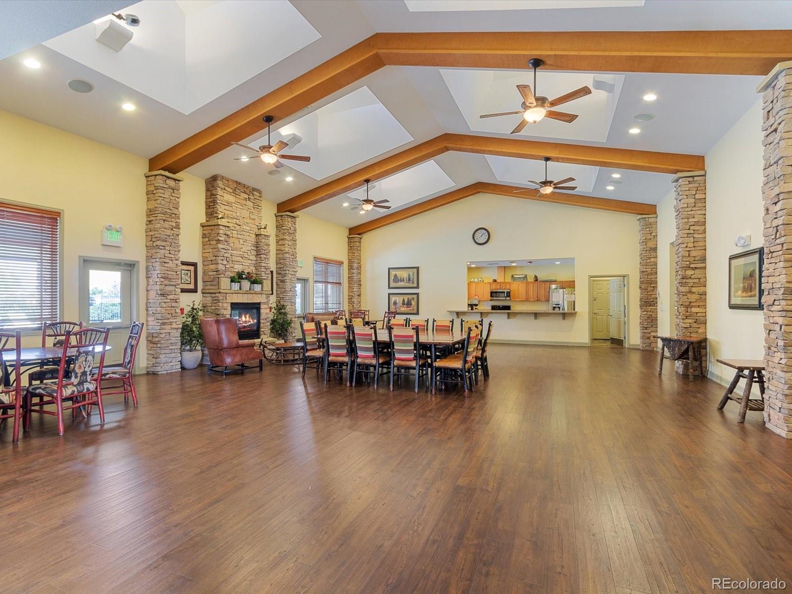 7775 Sage Green Frederick, CO 80530 - Photo 27 of 40 a living room with furniture and wooden floors