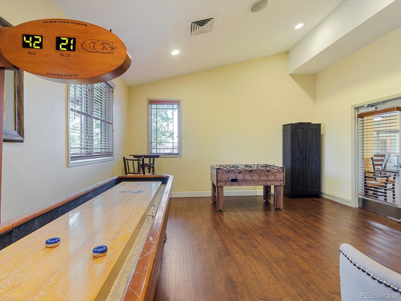 7775 Sage Green Frederick, CO 80530 - Photo 34 of 40 a room with furniture and window