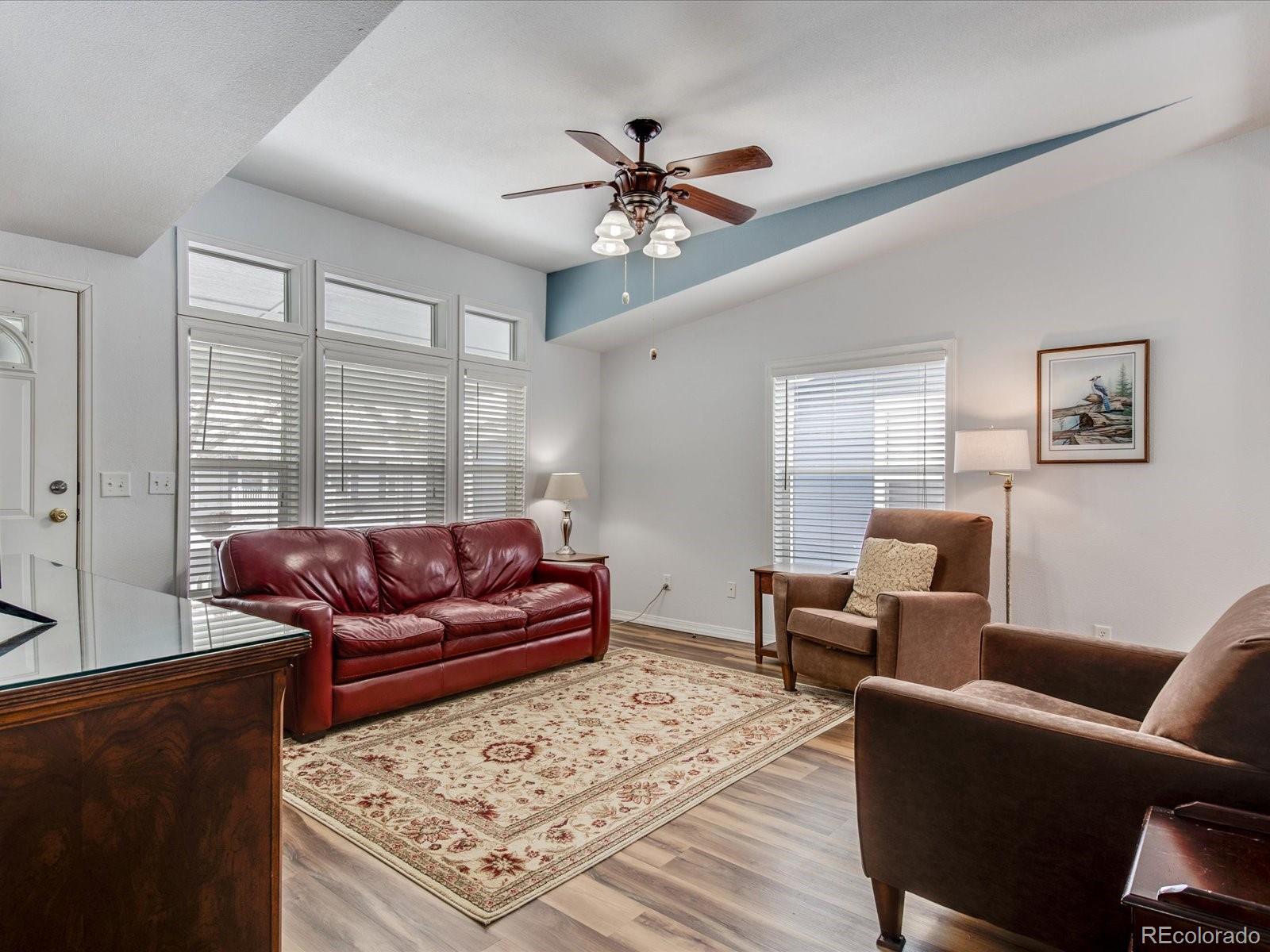 7775 Sage Green Frederick, CO 80530 - Photo 5 of 40 a living room with furniture and a window