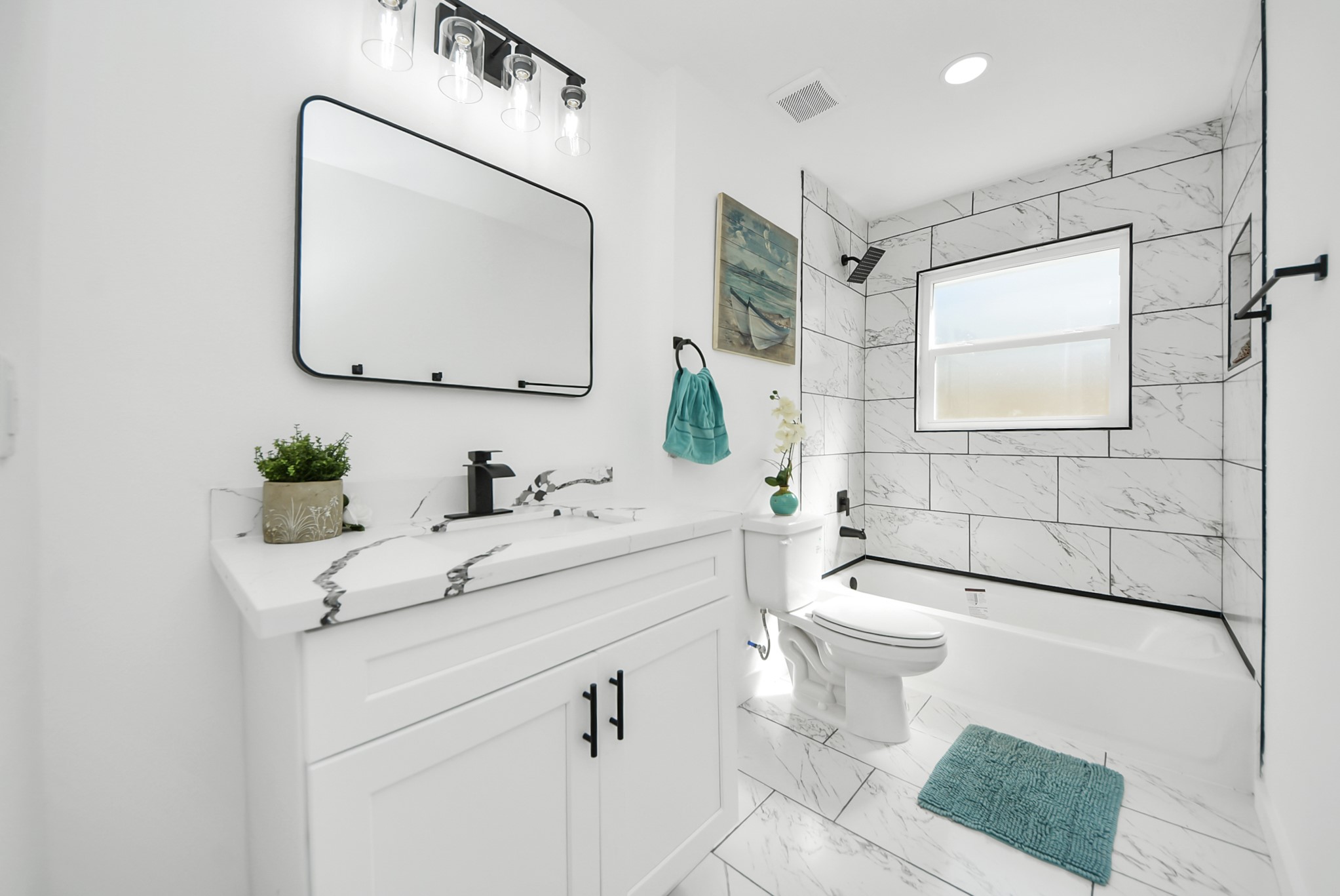 2701 Mustang Road Alvin, TX 77511 - Photo 17 of 45 a bathroom with a sink vanity granite toilet and a mirror