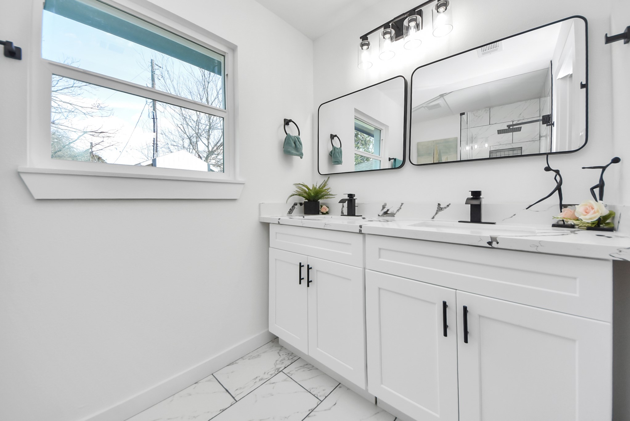 2701 Mustang Road Alvin, TX 77511 - Photo 19 of 45 a bathroom with a sink and a mirror