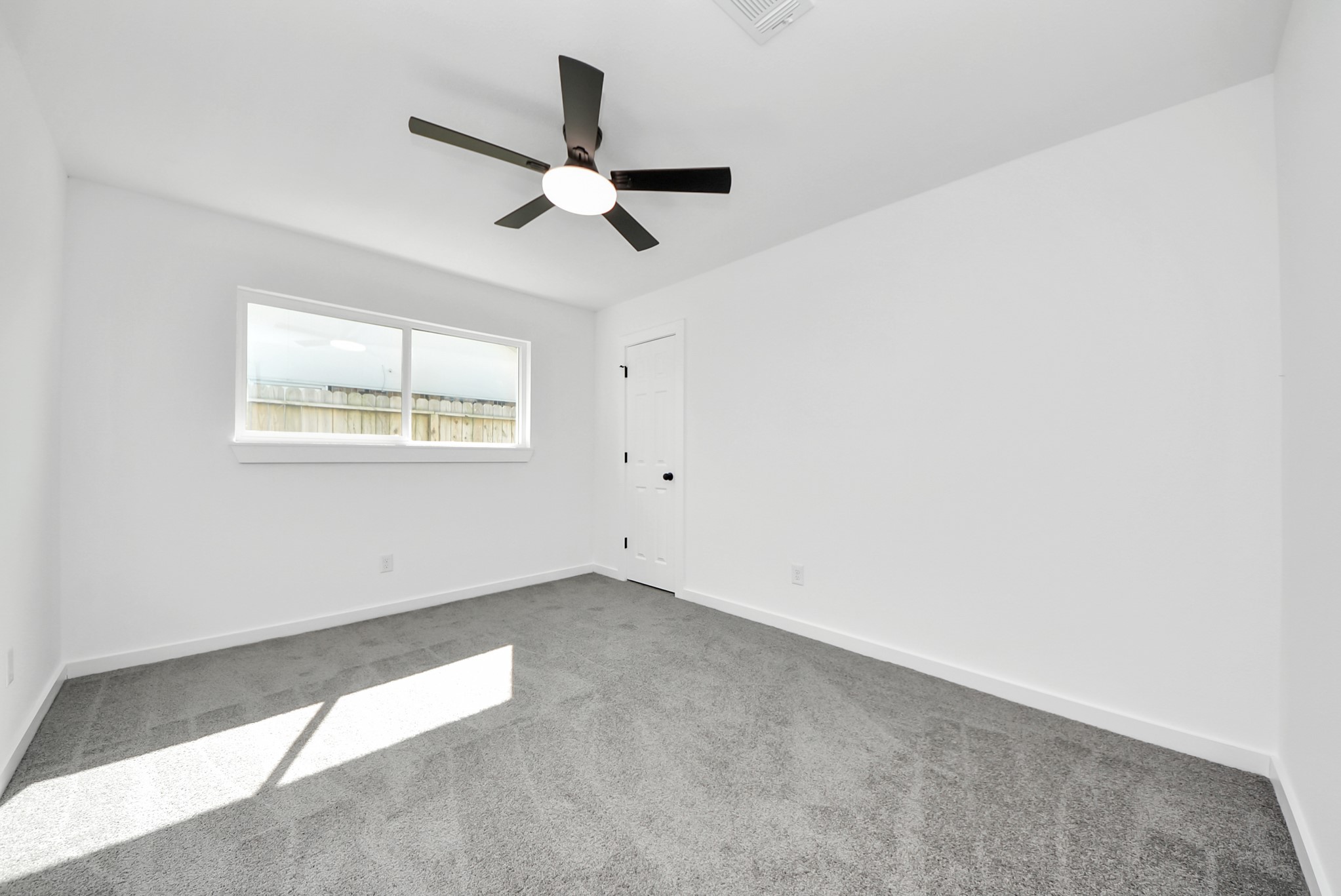 2701 Mustang Road Alvin, TX 77511 - Photo 25 of 45 an empty room with a window