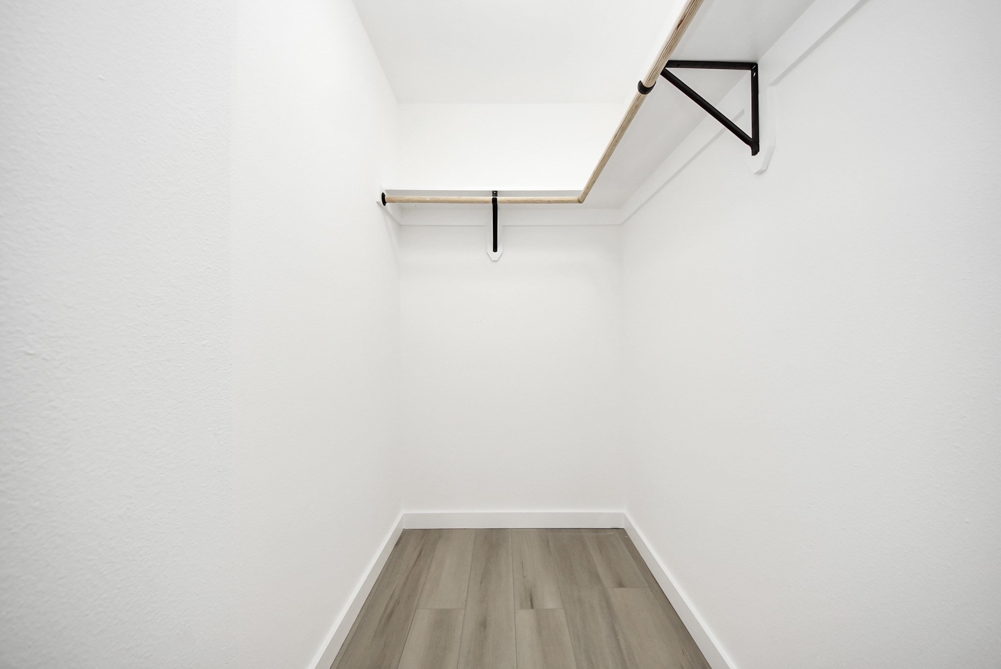 2701 Mustang Road Alvin, TX 77511 - Photo 31 of 45 a view of a room with wooden floor