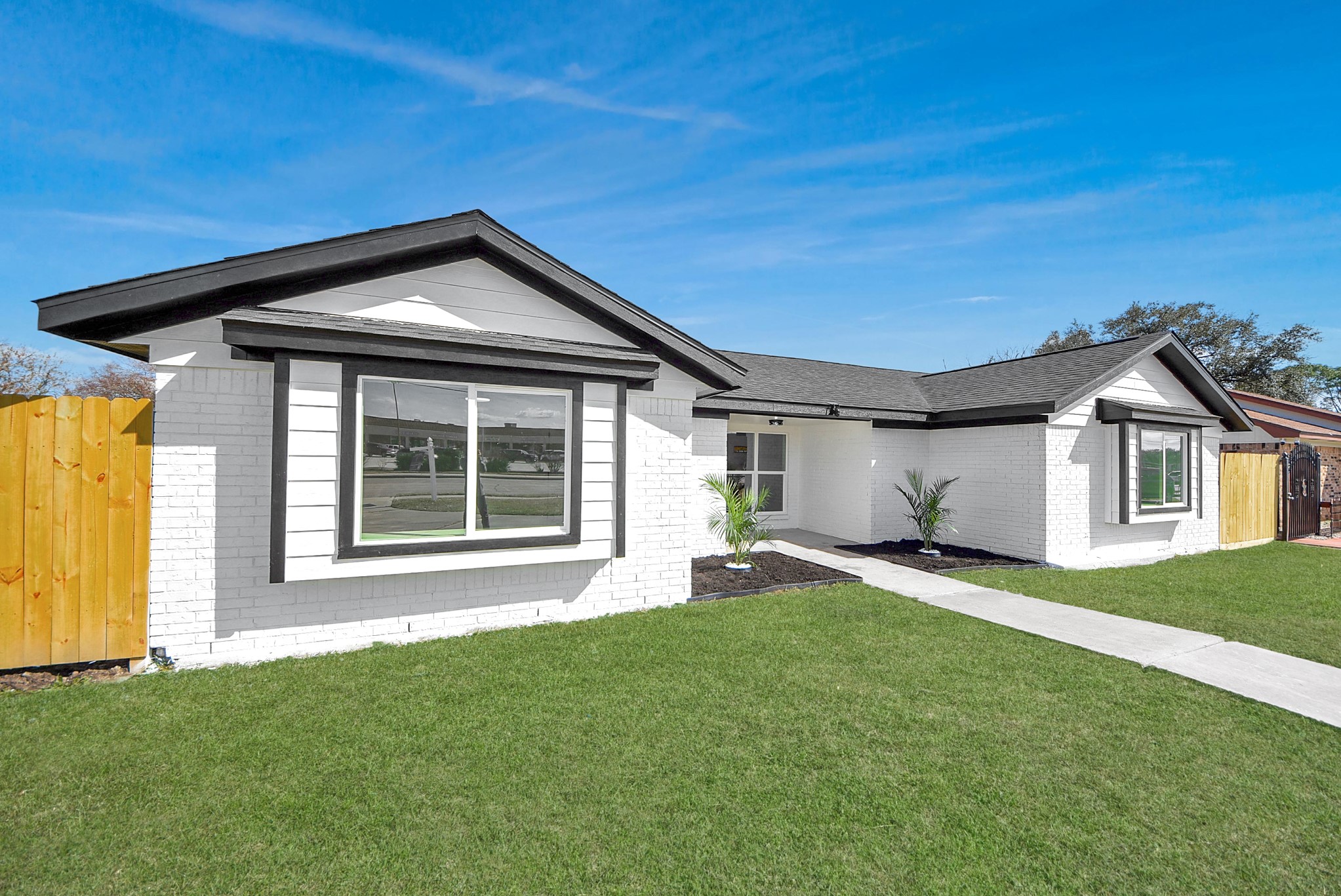 2701 Mustang Road Alvin, TX 77511 - Photo 37 of 45 a front view of a house with a yard