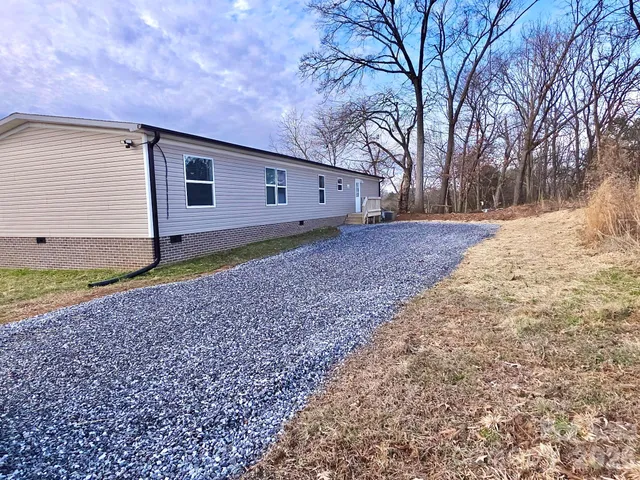 a house view with a backyard space