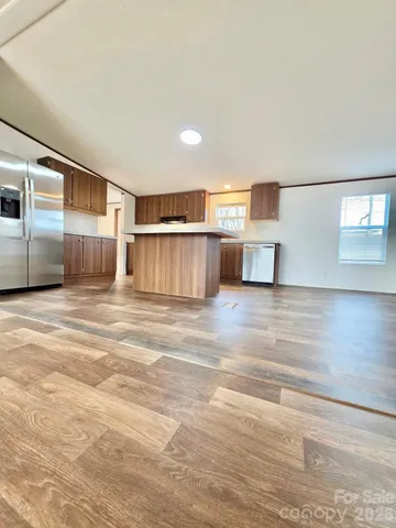 a view of a kitchen with a sink