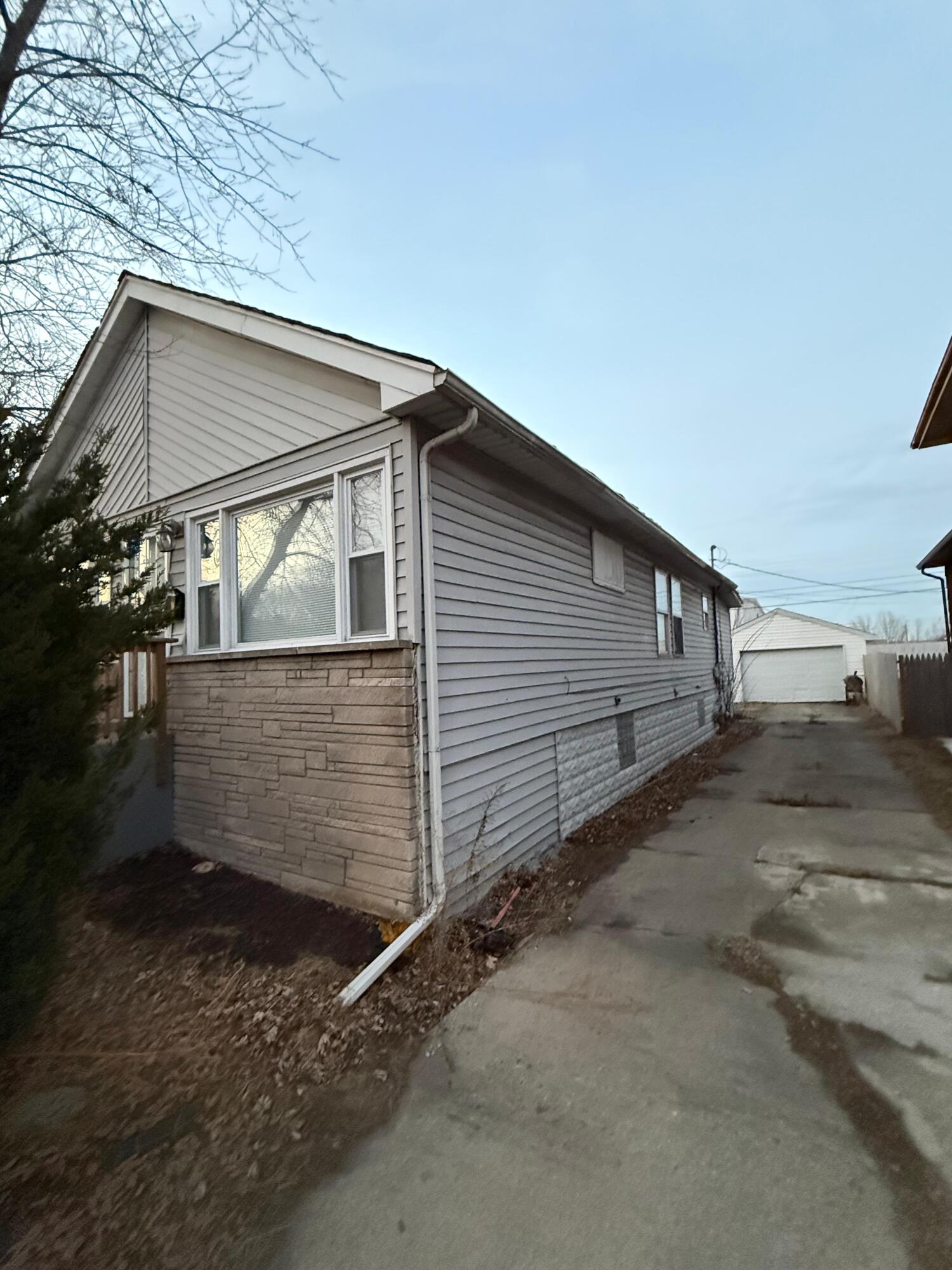 1347 Sherman Street Hammond, IN 46320 - Photo 2 of 15 a view of a house with a garage