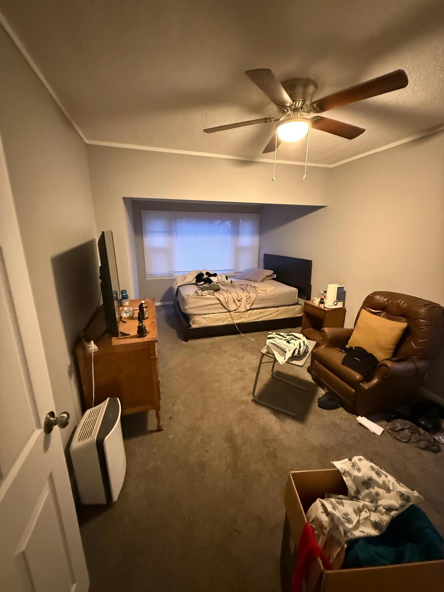 1347 Sherman Street Hammond, IN 46320 - Photo 3 of 15 a room with furniture and a ceiling fan