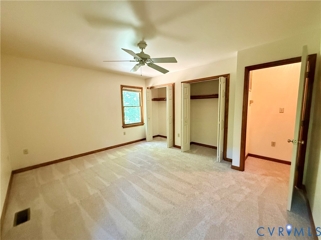 2590 Davis Mill Road Goochland, VA 23063 - Photo 16 of 33 a view of a big room with closet and windows